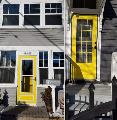 gray siding yellow doors